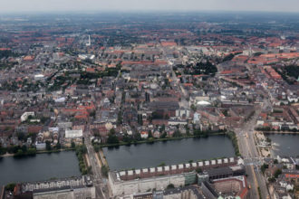 Byen strækker sine fingre ud